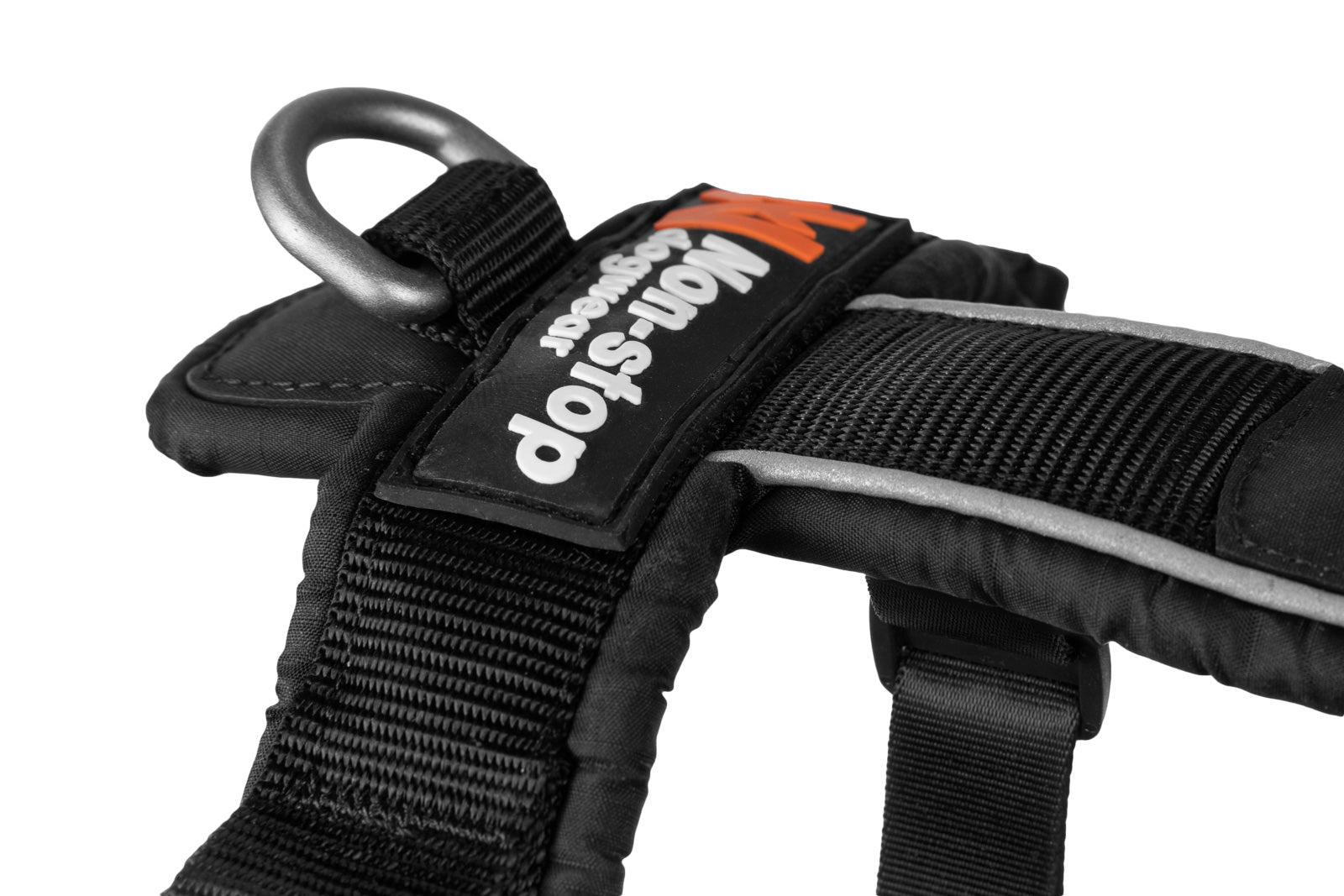 Black dog harness with a brand label on a white background